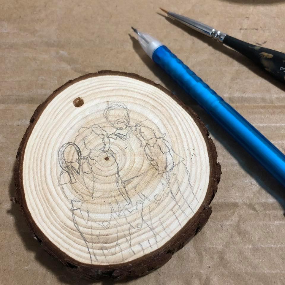 sketch family portrait on wood slice