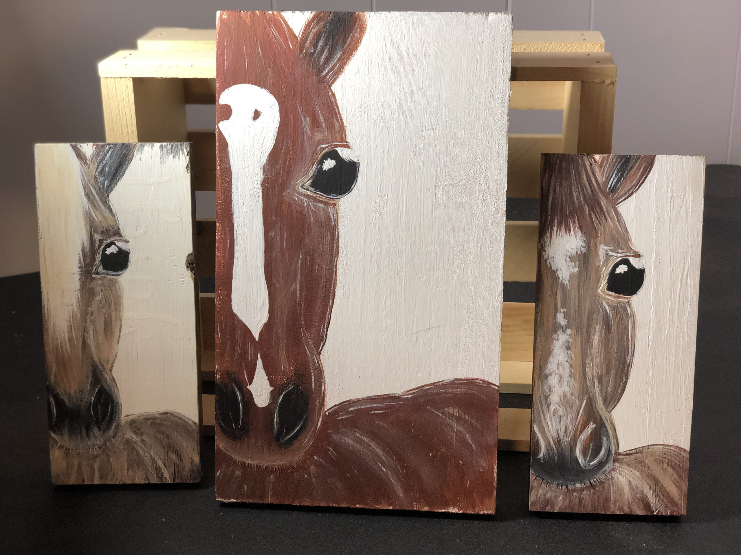 Three painted Horses faces